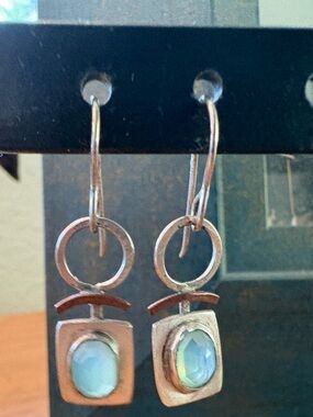 Collection of art fair earrings.